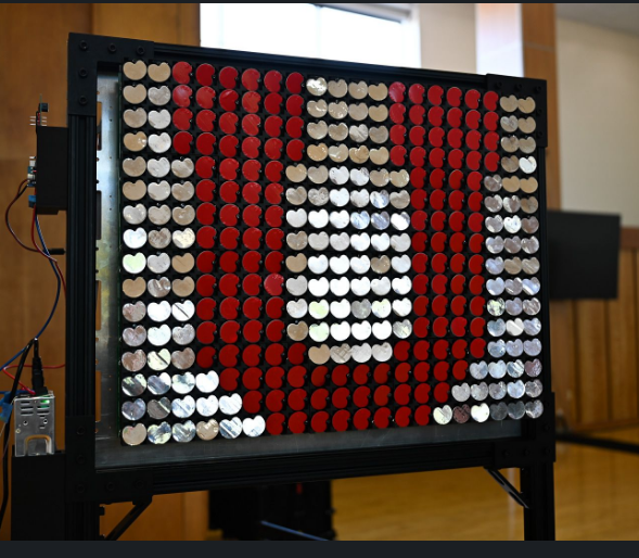 Flip disc display showing the University of Utah logo